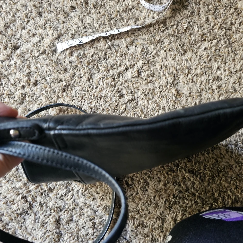Margot black leather crossbody bag with corner pocket on‎ a front